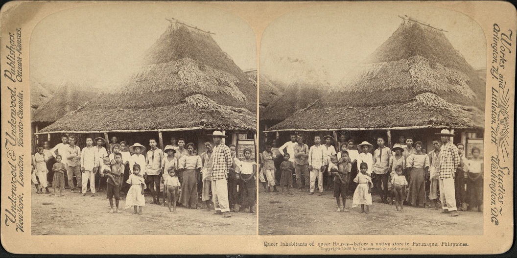 Queer Inhabitants of queer Houses – before a native store in Paran?aque, Philippines.